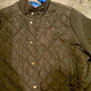 Woman Within Barn Jacket